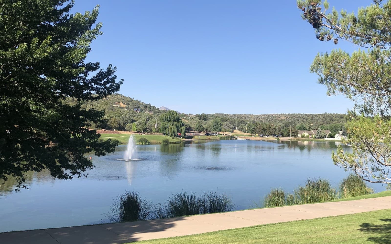 Green Valley Park lake and pine-covered hills in Payson